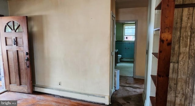 entrance foyer featuring a baseboard heating unit