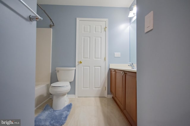 full bath featuring shower / washtub combination, vanity, and toilet