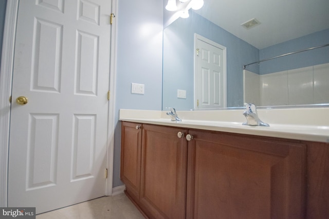 bathroom featuring visible vents and vanity