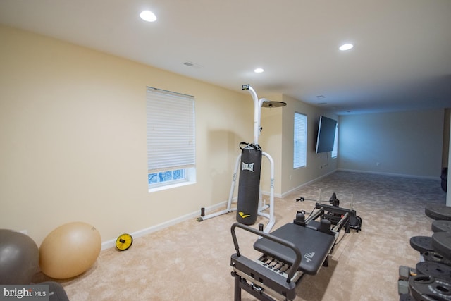 workout room featuring carpet, visible vents, baseboards, and recessed lighting