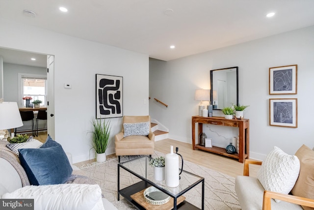 living room with light hardwood / wood-style floors