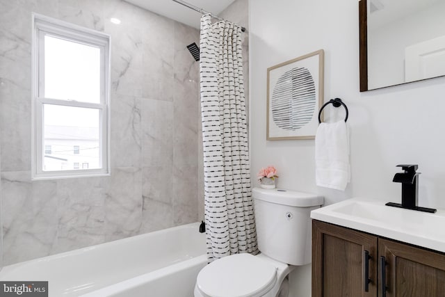 full bathroom with vanity, toilet, and shower / tub combo with curtain