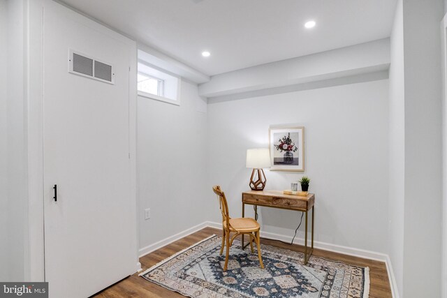 home office featuring hardwood / wood-style floors