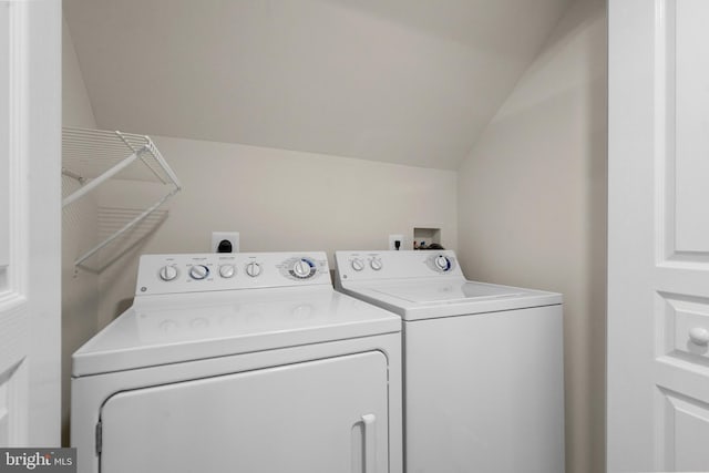 laundry room featuring separate washer and dryer