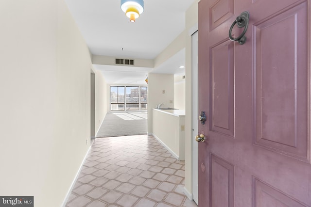 foyer entrance featuring sink