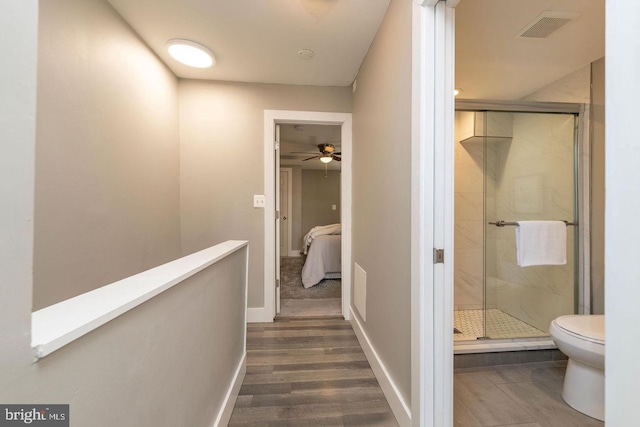 hallway featuring dark hardwood / wood-style floors