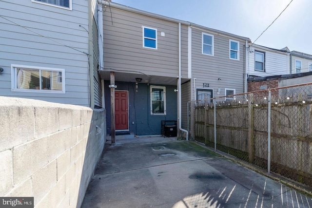 back of property featuring a patio area