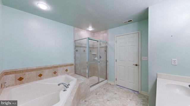 bathroom with separate shower and tub and sink