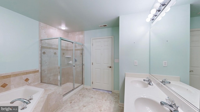 bathroom with vanity and plus walk in shower