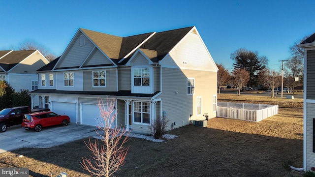 front of property with a garage