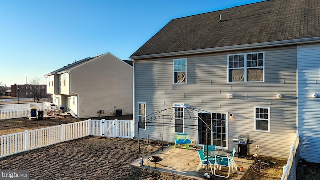 rear view of house featuring a patio area