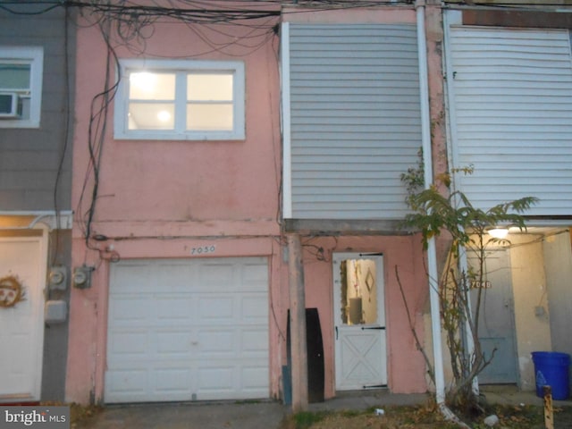 exterior space featuring a garage