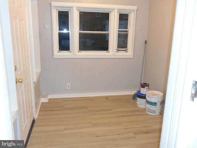 empty room with light wood-type flooring