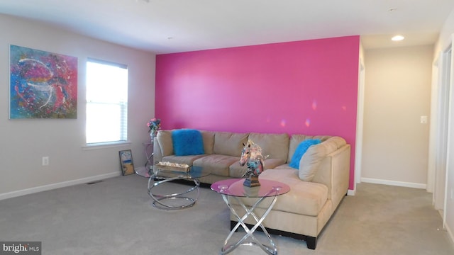 living room with light colored carpet