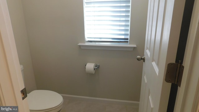 bathroom featuring toilet