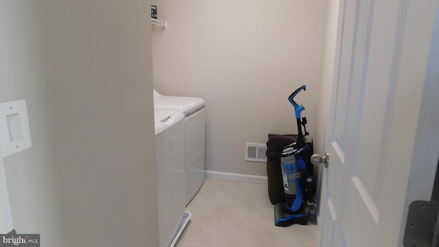 laundry area with separate washer and dryer