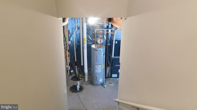 utility room with water heater