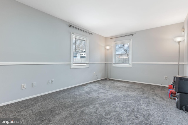 unfurnished room with carpet floors