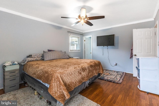 bedroom with wood-type flooring, ornamental molding, and ceiling fan