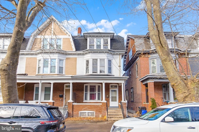 view of front of house featuring covered porch