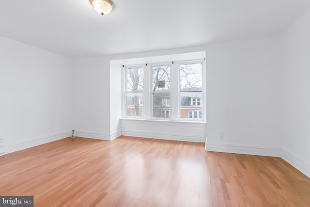 empty room featuring light hardwood / wood-style floors