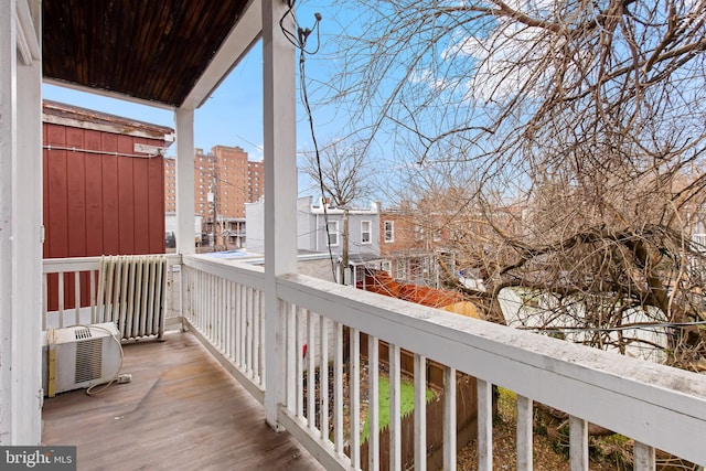 balcony with a wall mounted AC