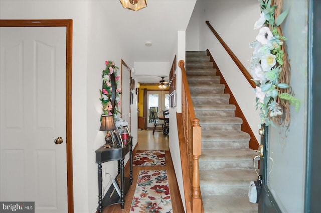 foyer entrance with light hardwood / wood-style flooring