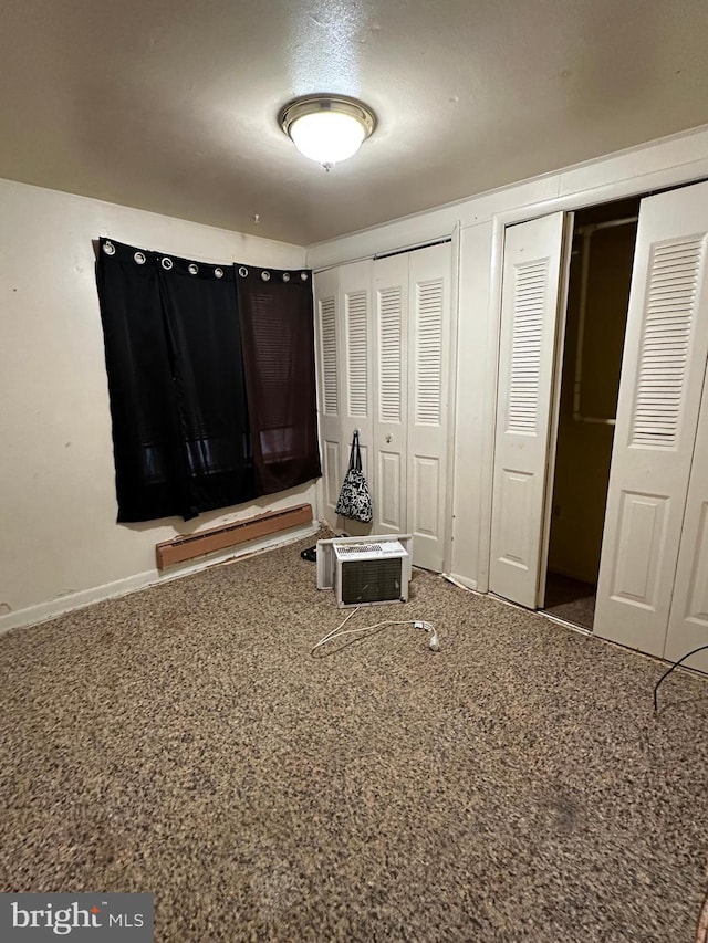 unfurnished bedroom with multiple closets