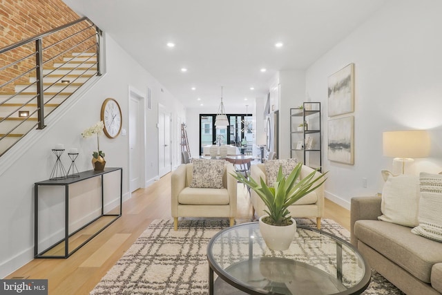 living room with light hardwood / wood-style flooring