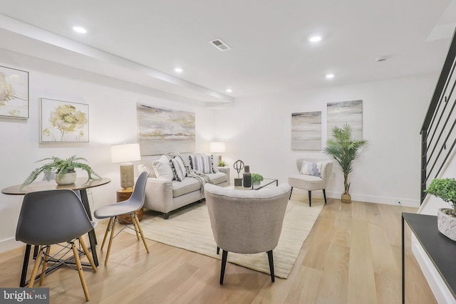 living room with light hardwood / wood-style floors