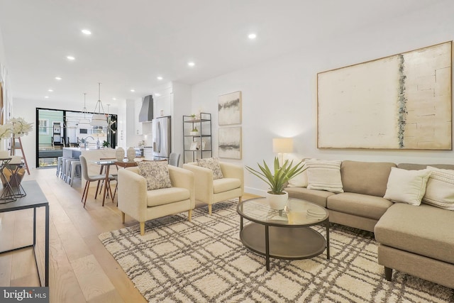 living room with light hardwood / wood-style flooring