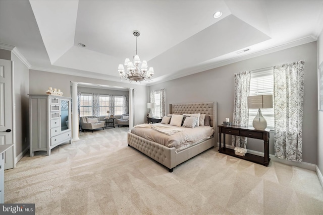 bedroom featuring light colored carpet, a tray ceiling, and multiple windows