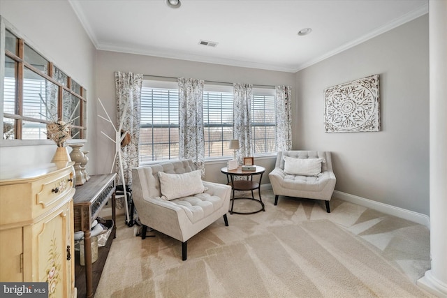 living area featuring ornamental molding and light colored carpet