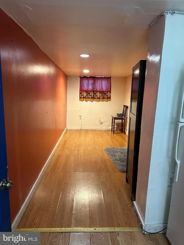 hallway featuring light hardwood / wood-style flooring