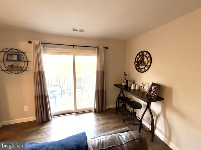 interior space with dark hardwood / wood-style floors