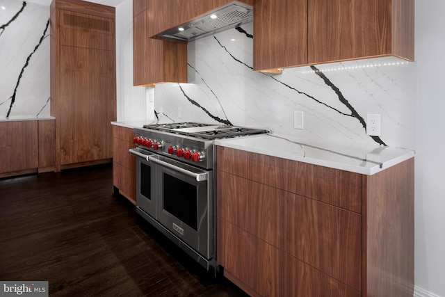 87 Library Pl, Princeton, NJ 08540 - kitchen with double oven range, premium range hood, modern cabinets, tasteful backsplash, and dark wood-style floors
