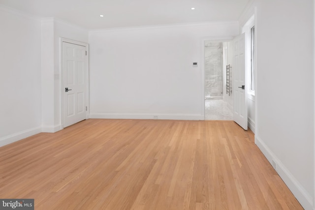 87 Library Pl, Princeton, NJ 08540 - unfurnished room featuring light wood-style floors, ornamental molding, baseboards, and recessed lighting