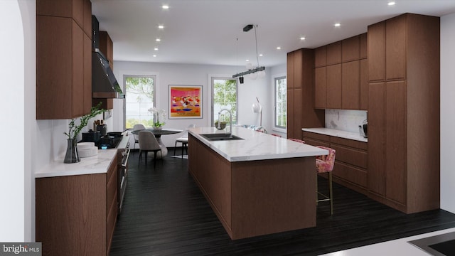 87 Library Pl, Princeton, NJ 08540 - kitchen featuring a sink, a center island, under cabinet range hood, high end stove, and modern cabinets