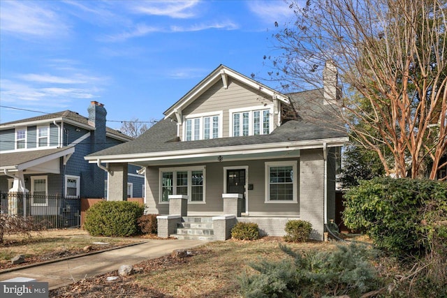 view of front of property featuring covered porch