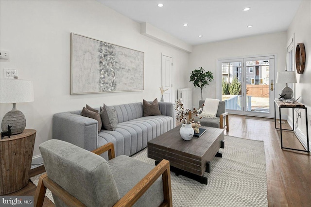 living room with light hardwood / wood-style flooring