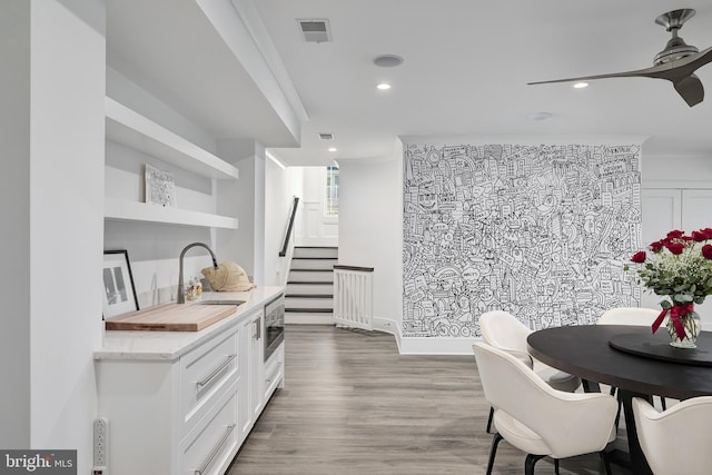 17-C Long Beach Blvd, Long Beach Township, NJ 08008 - dining space with wood finished floors, recessed lighting, stairway, ceiling fan, and baseboards
