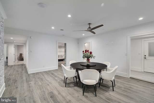 17-C Long Beach Blvd, Long Beach Township, NJ 08008 - dining space with light wood-type flooring, baseboards, a ceiling fan, recessed lighting, and crown molding
