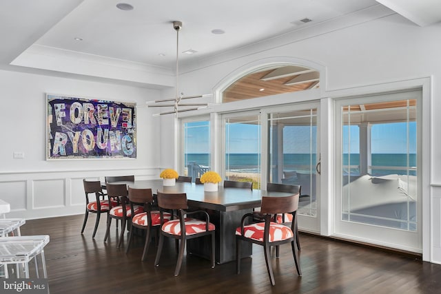 17-C Long Beach Blvd, Long Beach Township, NJ 08008 - dining room with dark wood-style flooring, a decorative wall, a wainscoted wall, and ornamental molding