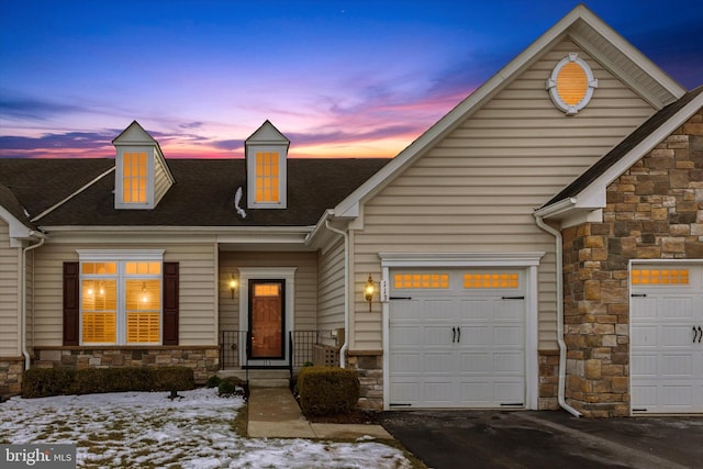 view of front of property featuring a garage