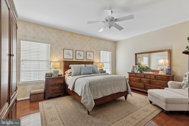 bedroom featuring hardwood / wood-style floors and ceiling fan