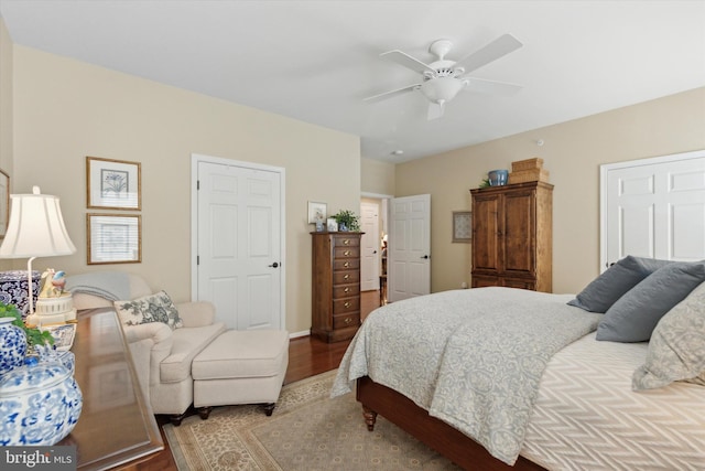 bedroom with wood-type flooring and ceiling fan