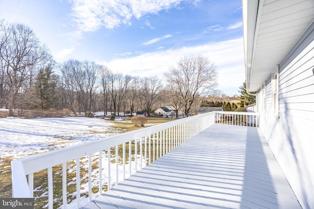 view of snow covered deck