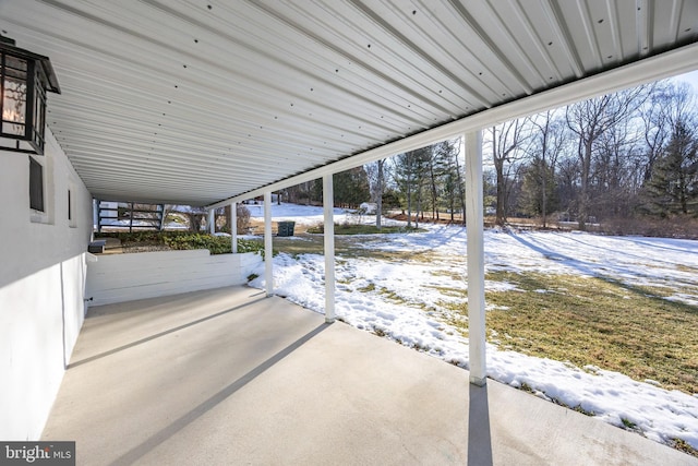 view of snow covered patio