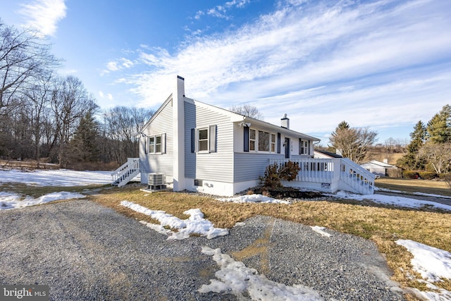 view of property exterior with cooling unit