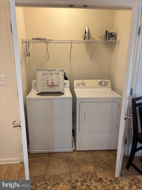 laundry room featuring washer and clothes dryer